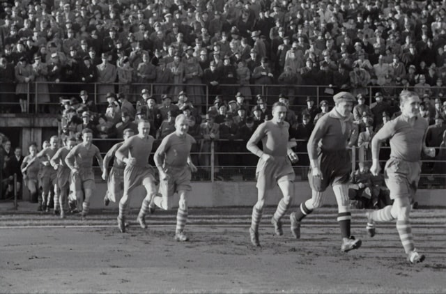 Austrian soccer team running onto the field