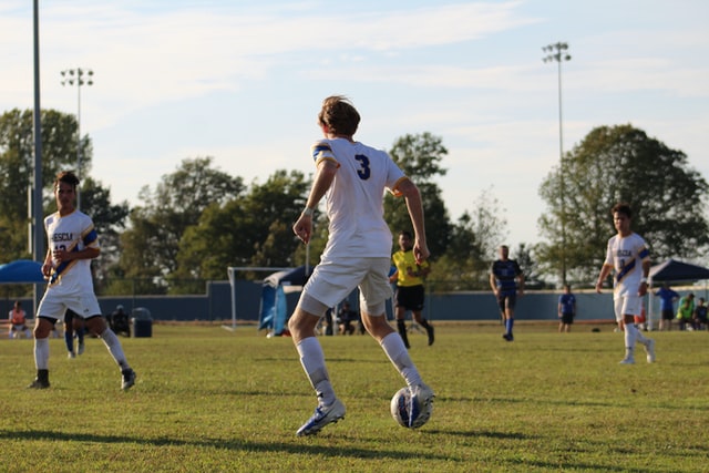 soccer player controlling the ball