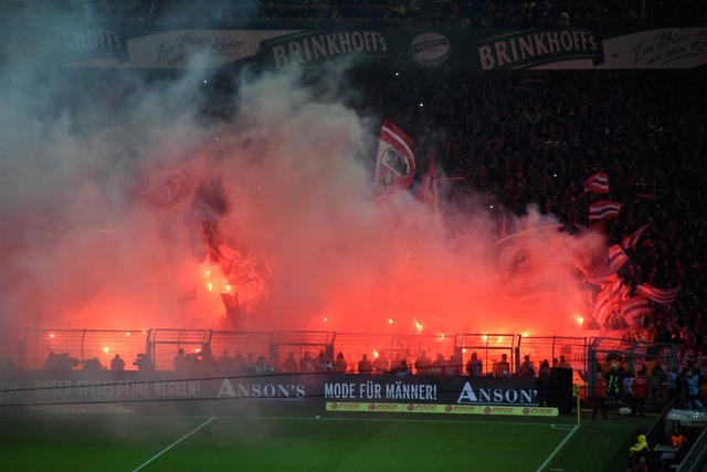 Soccer fans with flares