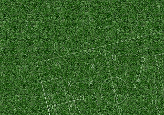 Soccer tactics on green background